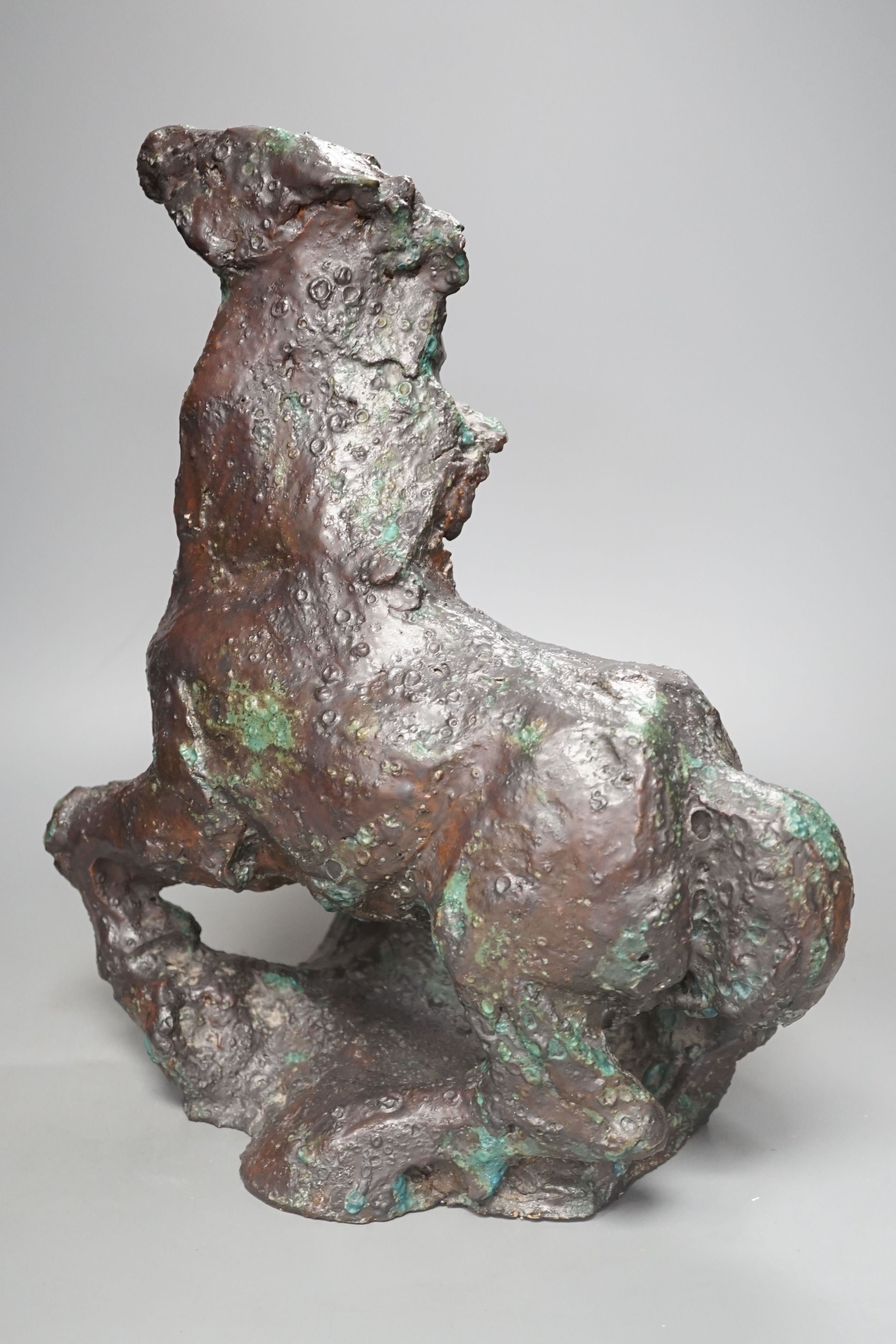 A large abstract bronzed pottery model of a horse horse, 38 cms high.